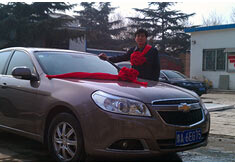 超前涂料獎勵員工轎車，真石漆生產(chǎn)廠家！